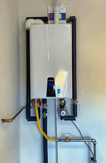 https://applecrosshotwater.com.au/uploads/2025/06/instant-hot-water-systems-63860.jpg